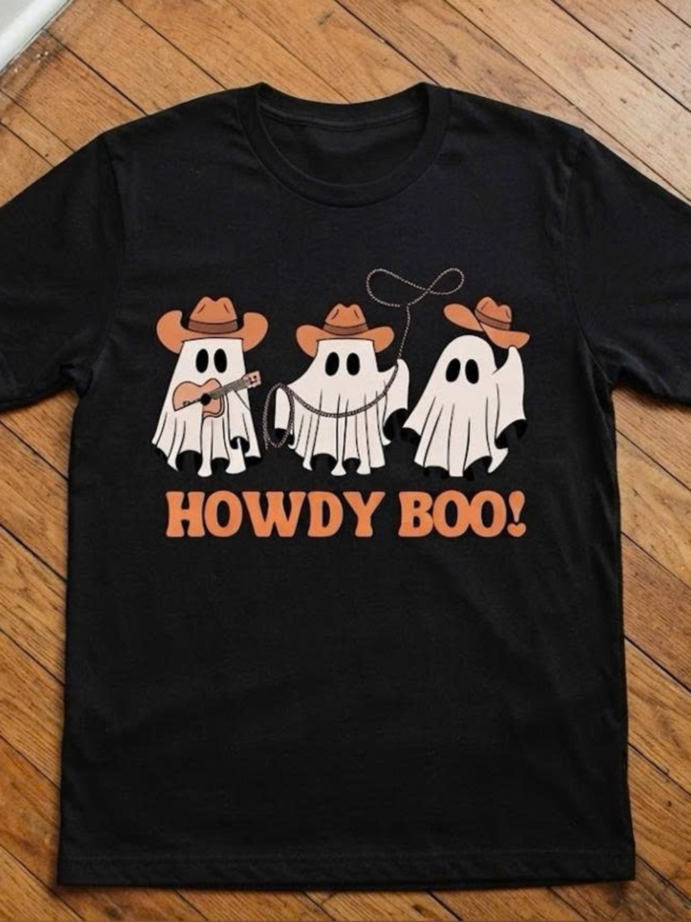 Black Tee with Orange and Cream Cowboy Ghosts